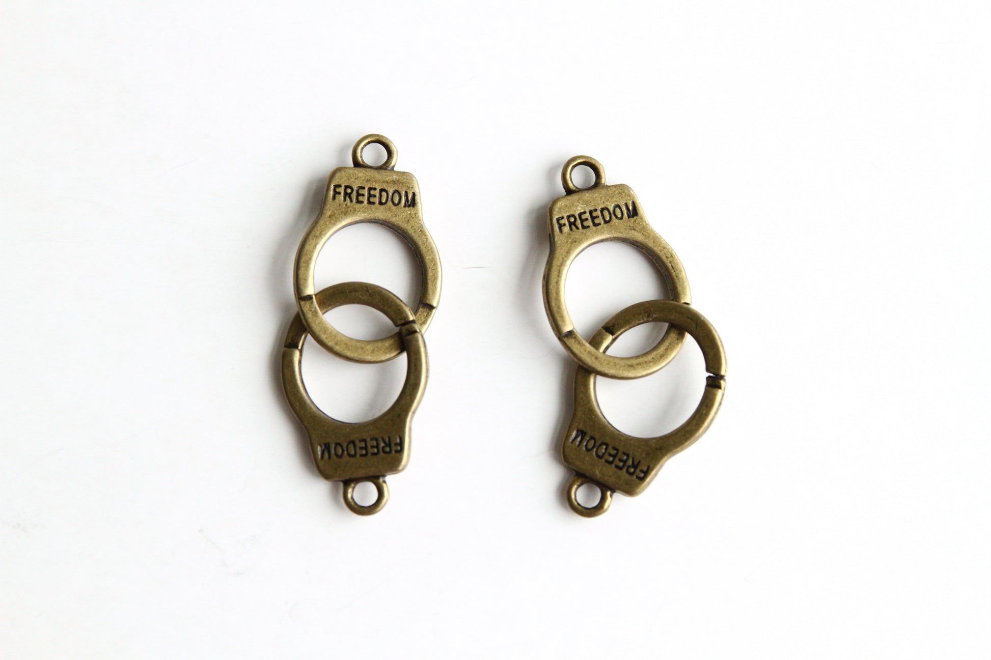 Charm - Handcuffs, Antique Brass - KEY Handmade
 - 1